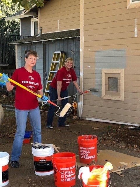 Lori and Susan painting