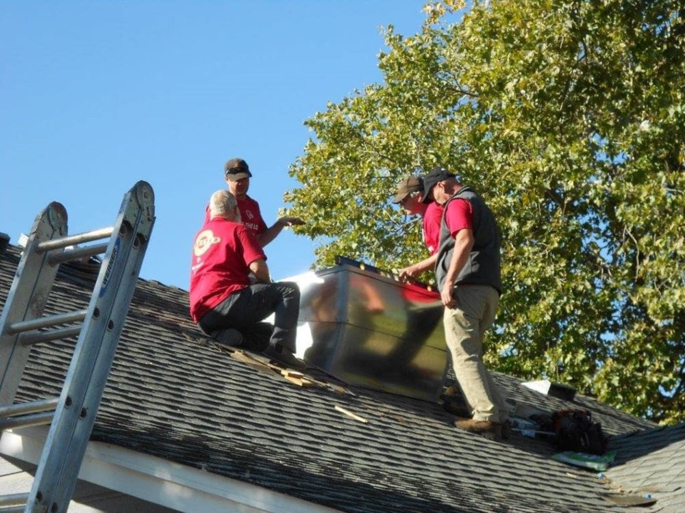 Guys working on a roof