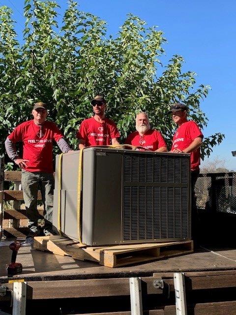 Guys on a truck with the new unit